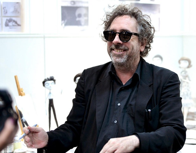 SAN DIEGO, CA - JULY 12:  Director/producer Tim Burton sign autographs during Comic-Con International 2012 at San Diego Convention Center on July 12, 2012 in San Diego, California.  (Photo by Alberto E. Rodriguez/WireImage)