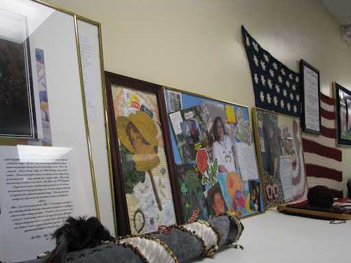 On this wall patients have sent art to be displayed in the halls of the clinic. (Photo by Kenrick Nobles)