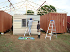 Fitting external cladding to living quarters