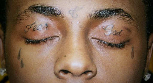 tattoos on eyelids. fear god eyelid tattoos