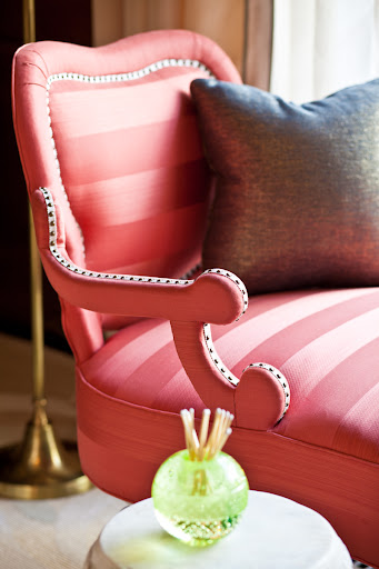 This arm detail is so interesting and unique -- I've never seen something like it. (Kemble Interiors, Inc.)