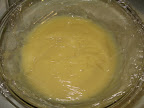 Classic Vanilla Pudding covered with plastic wrap directly against the pudding.