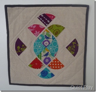 Ornate mini quilt in Echino and linen