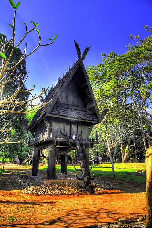 Black temple Chiang Rai small house on stilts 2