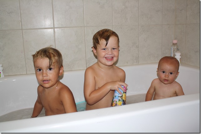 3 men in a tub