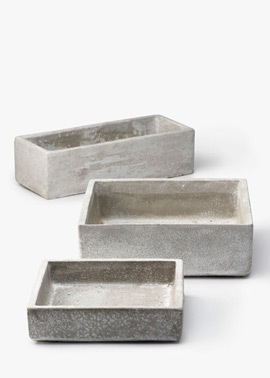 Square and rectangular cement containers with a matte, white-wash finish.