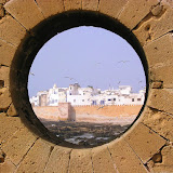 View of Essaouira, Morocco through the old Portuguese ramparts with seagulls.
