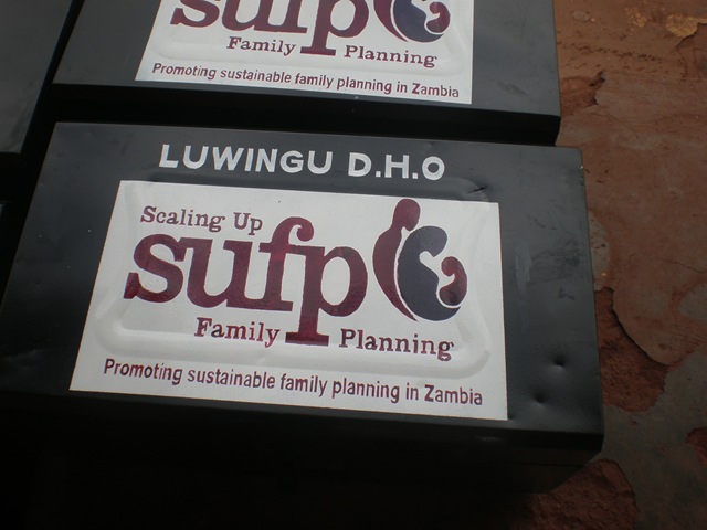 [Project%2520logo%2520on%2520box%2520of%2520family%2520planning%2520supplies-%2520handpainted%255B3%255D.jpg]