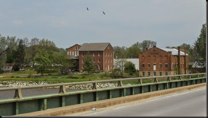 view of a portion of historic Bonaparte, IA from the brdge over the Des Moines River