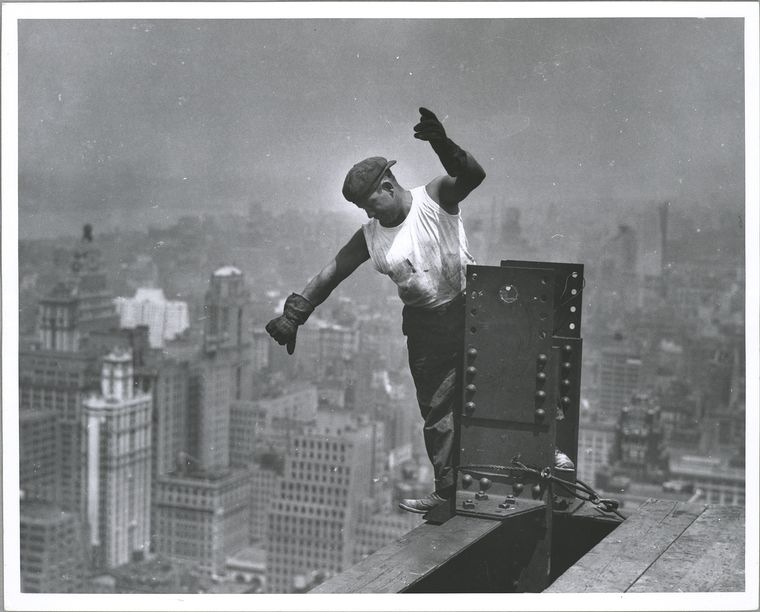 [Worker-on-Empire-State-building-sign.jpg]