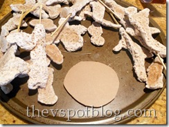 Salt dough pieces, drying on a cookie sheet.