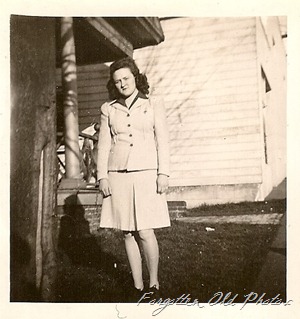 1940s gal with short skirt DL Antiques