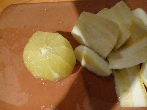 After trimming the lemon ends, follow the curve of the fruit to remove zest and pith.