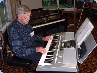 Michael Bramley playing his Yamaha PSR-910 keyboard