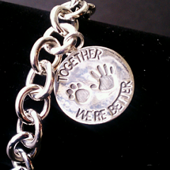 If you want to go all out and splurge on the 'mac daddy'...or rather 'mac mommy' item in the collection, the bracelet offers a choice of the cat or dog themed clasp...