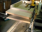 Screws went in pre-drilled, countersunk holes.