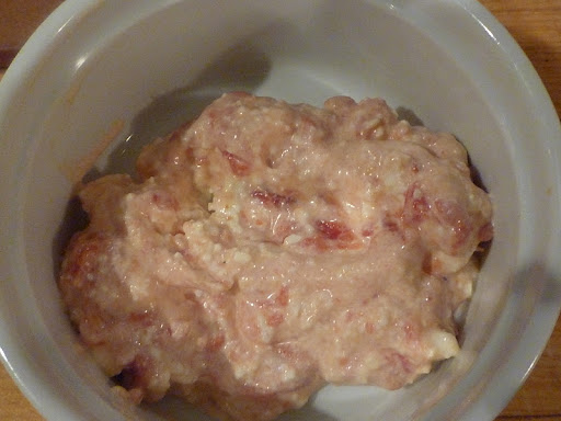 A combo of feta, cream cheese, and tomato to spread on the sandwich bread.