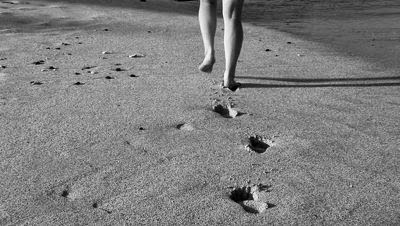 [stock-footage-woman-walking-along-the-beach-big-island-hawaii%255B4%255D.jpg]