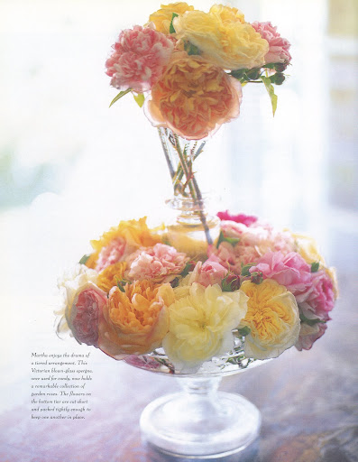 This Victorian blown-glass epergne, once used for candy, now holds a remarkable collection of garden roses. (The Best of Martha Stewart Living -- Arranging Flowers)