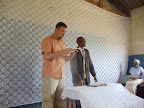 Steve teaching the Bible study, translated by Pastor Zozi