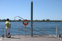 Queens Quay, Toronto, May 2010: Man pondering life Queens Quay, Toronto, May 2010: Man pondering life