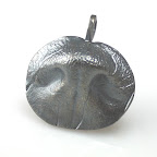 ...on my nose 
(Nose impression pendant by Brent & Jess)