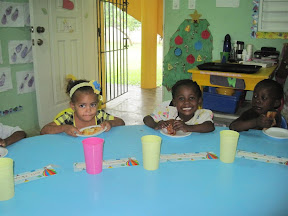 Yiskeiry, Rosita and Renaldo gobbling up their pieces.