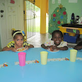 Yiskeiry, Rosita and Renaldo gobbling up their pieces.