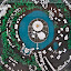A little model of Auroville with the Matrimandir in its center and the green belt at its edge.
