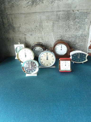 Brown Paper Designs brought a selection of old clocks, which were set up on the high-boy tables around the bar. They were set to midnight in honor of the holiday. Brown Paper Designs brought a selection of old clocks, which were set up on the high-boy tables around the bar. They were set to midnight in honor of the holiday.