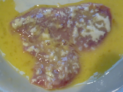 Now dip in beaten egg.