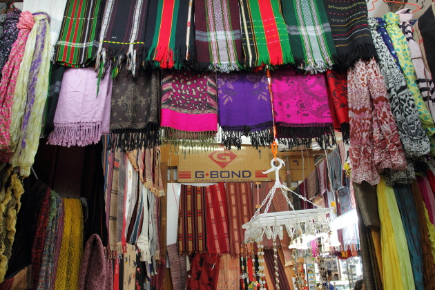 Clothes and Tribal Artifacts for sale at Bogyoke Market, Yangon, Burma