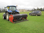 Phil Cole's Vertidrainer on the course near The Lake and Badminton House