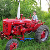 Kai on my brother John's tractor