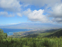 Clouds clearing from the top of Haleakala gives an awesome view of Maui.