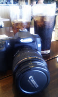 Two cokes and a camera