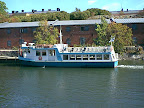 Docked waterbus in harbor Docked waterbus in harbor