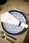 Step 4: Fold the napkin, and secure it with a loop of pretty rope.