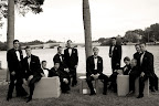 Mark and the groomsmen, out by the water, pose for a portrait (with photographer Missy McLamb). The furniture vignette offered a great setting for the group photo. Mark and the groomsmen, out by the water, pose for a portrait (with photographer Missy McLamb). The furniture vignette offered a great setting for the group photo.