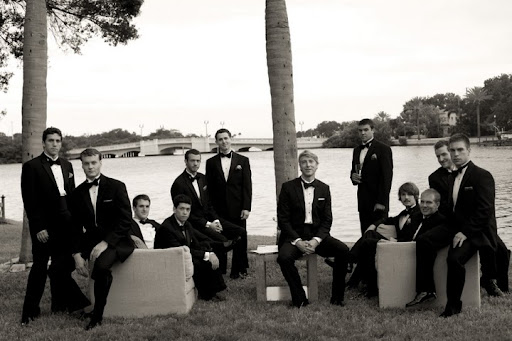 Mark and the groomsmen, out by the water, pose for a portrait (with photographer Missy McLamb). The furniture vignette offered a great setting for the group photo. Mark and the groomsmen, out by the water, pose for a portrait (with photographer Missy McLamb). The furniture vignette offered a great setting for the group photo.