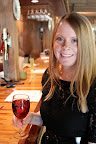 June with a glass of strawberry wine. It smelled just like fresh strawberries and was a very tasty wine indeed.