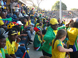 We went to Thulamahashe (the nearest township/grocery store to our village) and they had a big screen TV set up in their stadium to broadcast the World Cup games. Lora did a little jig with one of our fellow teachers (Vivian) just before the game began. South Africa - 379.jpg