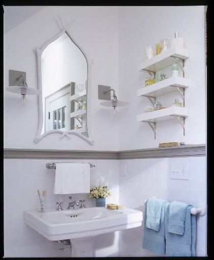 These chunky, stacked shelves hold toiletries as an alternative to a medicine cabinet. These chunky, stacked shelves hold toiletries as an alternative to a medicine cabinet.