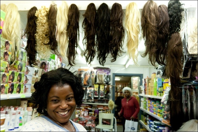 29/10/2011 -- ADV PHOTOJOURNALISM -- Comfort has her own cosmetic salon. Comfort Salon is one of many similar establishments on Moore Street in Dublin, usualy owned by African immigrants. Photograph: Aleksander Szojda / DCU