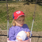 Grandma Visits- Simona in swing.JPG
