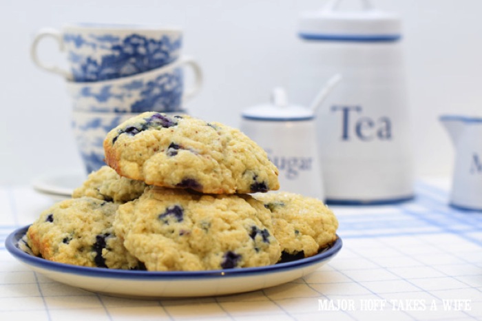 How to make melt in your mouth blueberry scones. A melt in your mouth recipe for blueberry scones. Inspired by Starbucks in house version, this blueberry scone with hints of lemon and a crunchy sugary top will delight everyone. Serve during High Tea, or just as a mid afternoon snack. Perfect along side tea or coffee, or as a stand alone blueberry dessert. You won't believe how easy these are to make! Never made scones before? Never fear, this includes a step by step tutorial on how to make scones. #HighTea #blueberries #Starbucks #scones #dessert #DowntonAbbey How to make melt in your mouth blueberry scones
