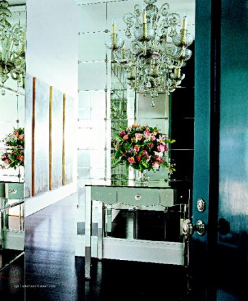 Walls lined with floor-to-ceiling windows open up small spaces, like this foyer (image from MSL, February 2008)