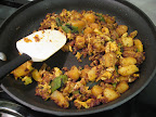 One day we made breakfast for dinner: (Mexican) chorizo, potato, egg, and poblano tacos with some pan-grilled zucchini on the side. It turns out Jon used to eat something very much like this regularly for breakfast when he lived in Austin. We got the chorizo at a local Mexican grocery store. It was really good.