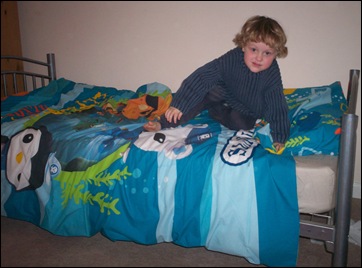 Enjoying his new Octonauts duvet