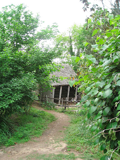 Looking down to the barn and vegetable garden of the East Texas house.